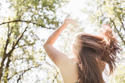 girl in nature, part of self care coaching