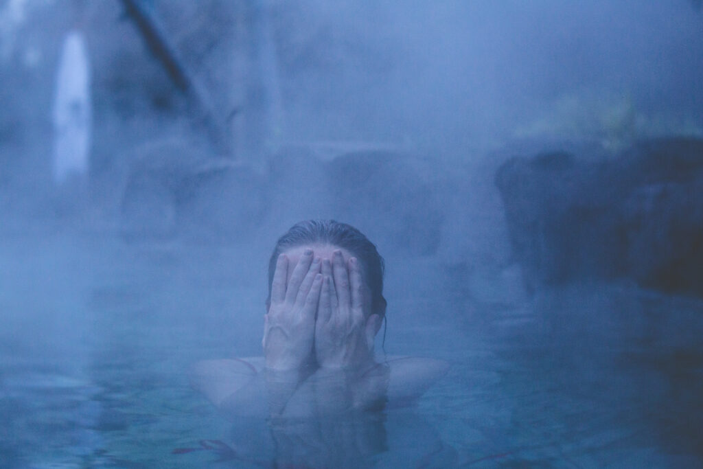 woman in a dark pool