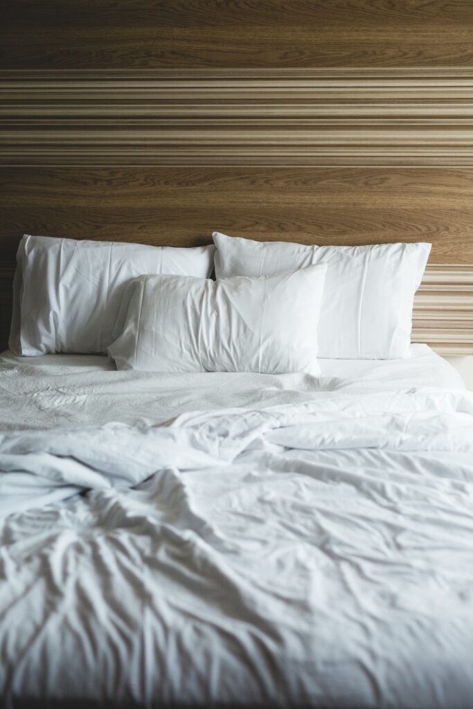 empty bed with sheets