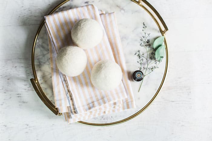 wool dryer balls prepping for child laundry