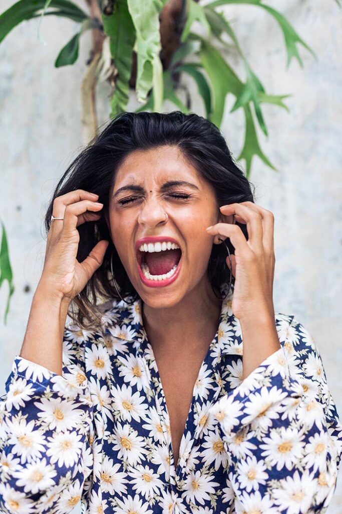 woman screaming out loud at toxic relationship