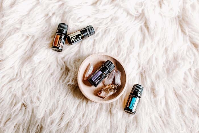 essential oils on a sheepskin rug