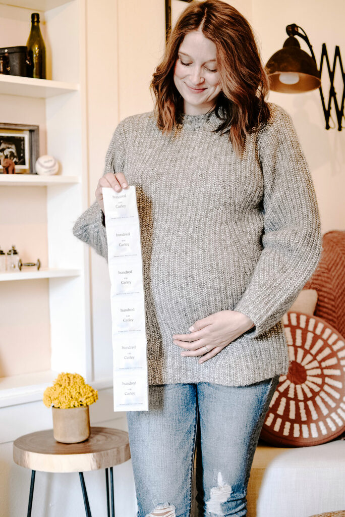 woman holding supplement packets