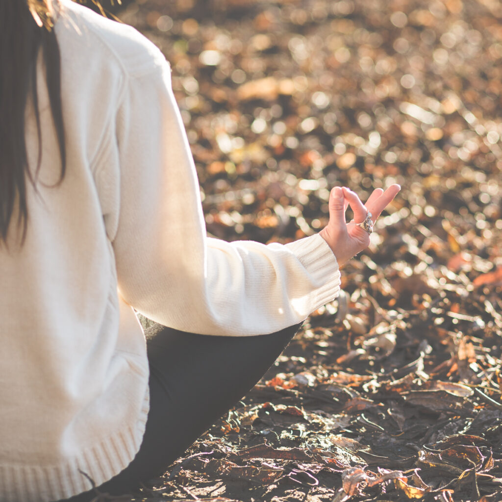 woman meditating in nature free self-care