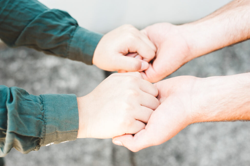 couple holding hands