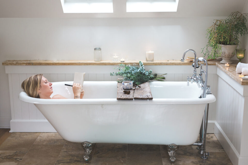 Journaling in relaxing bathtub