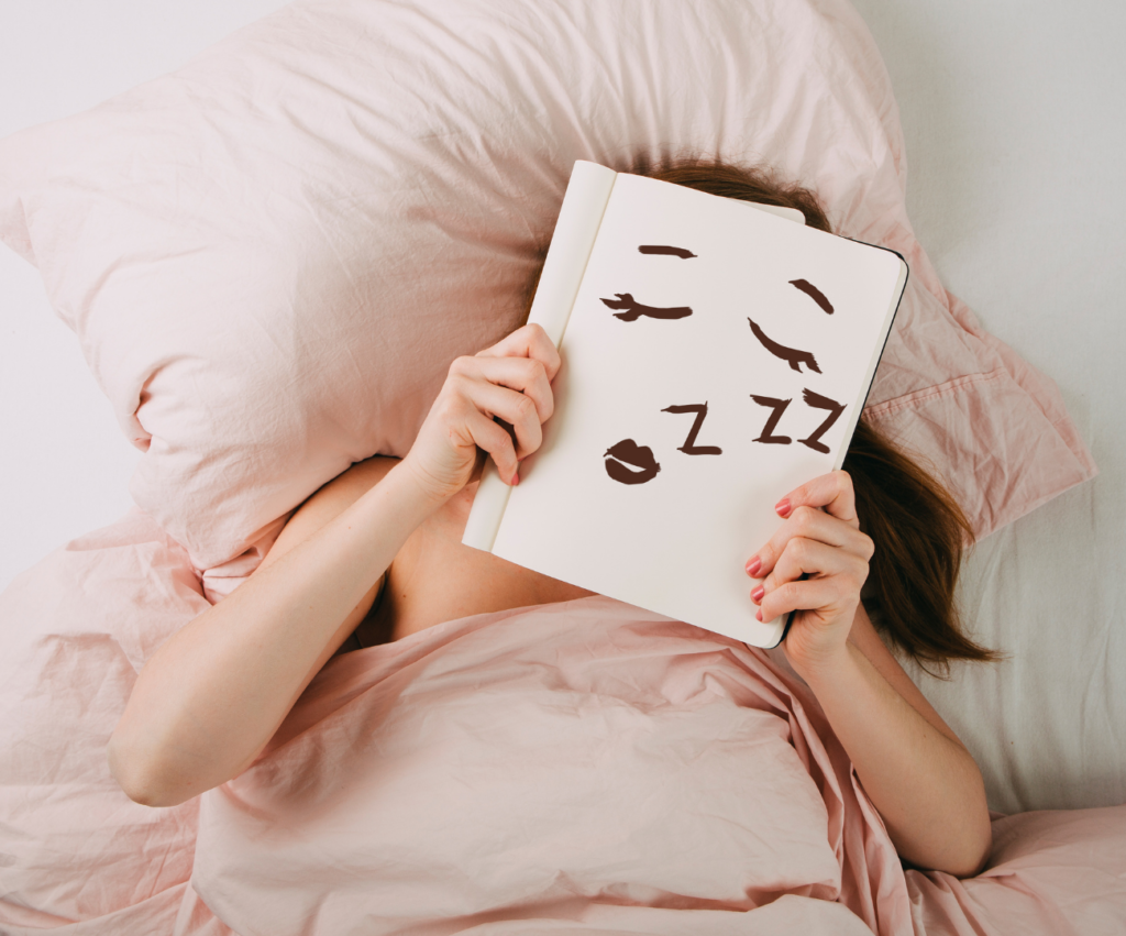 woman in bed reading a book