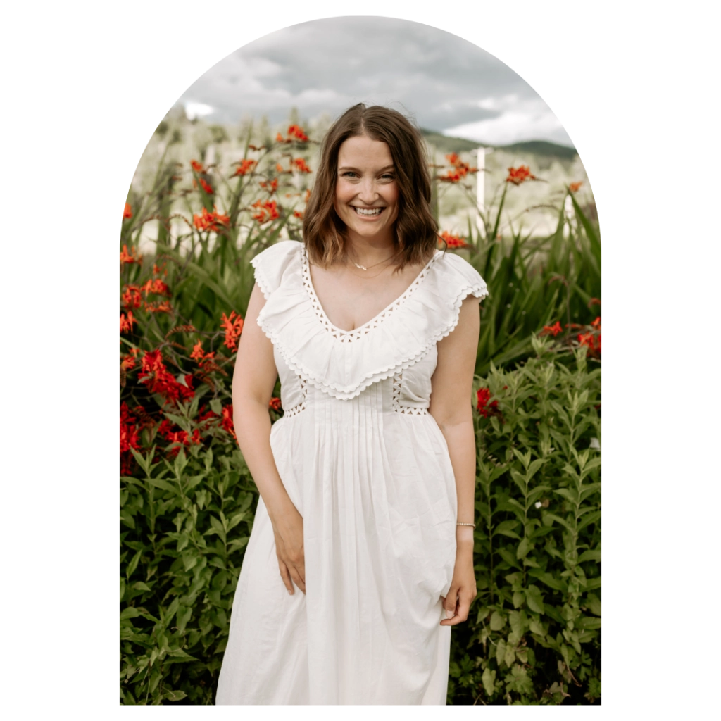 Carley Schweet headshot in flower field